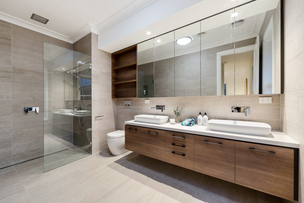 bathroom with double vanity sinks